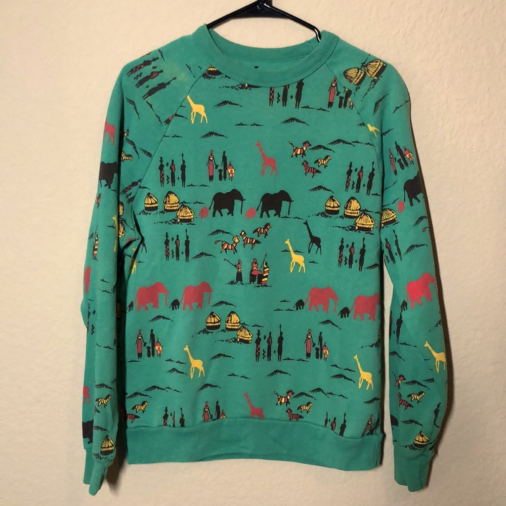 Teal color sweatshirt with African inspired print